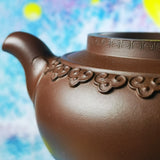 Zisha teapot by Artist Level 2, CAO Lan Fang 曹兰芳 L2-2011   紫泥“三脚云肩如意”