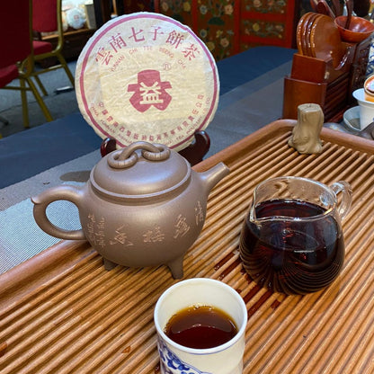 2003 紫大益 (玫瑰大益）圆形大益商标（经典嫩叶型）Daetea (Da Yi) 7262-301 Ripe Pu’erh (Vintage Classic, 7262 Formula)