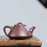 Zisha teapot by artist Level 3, YANG Fei 杨菲（L3-2021）文革紫泥 紫砂壶 “子冶石瓢”