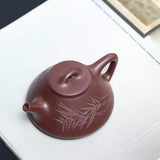 Zisha teapot by artist Level 3, YANG Fei 杨菲（L3-2021）文革紫泥 紫砂壶 “子冶石瓢”
